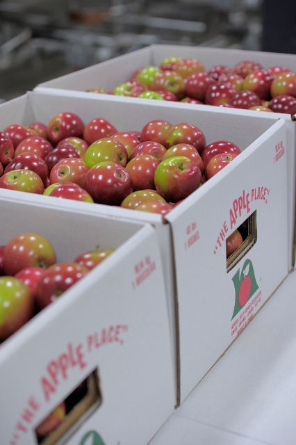 Smaller apples in a box